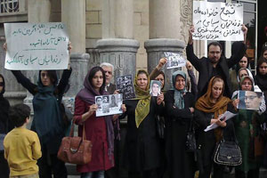 Families of Iran prisoners stage protest outside parliament