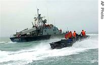 Iranian naval vessels on maneuvers 